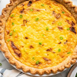 Cottage Cheese Quiche (Creamy, High-Protein, Easy Meal) Cottage Cheese Quiche Freshly baked cottage cheese quiche with golden crust and green onions