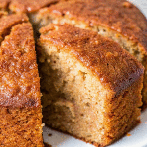 Easy Banana Butter Cake – Light, Moist & Buttery easy banana butter cake Close-up of easy banana butter cake with a golden crust and moist, fluffy interior.